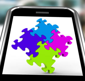 Puzzle Squares On Smartphone Shows Pieces of Online Marketing