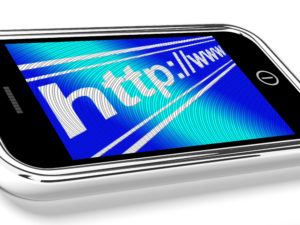 smartphone with URL address of a website redesign
